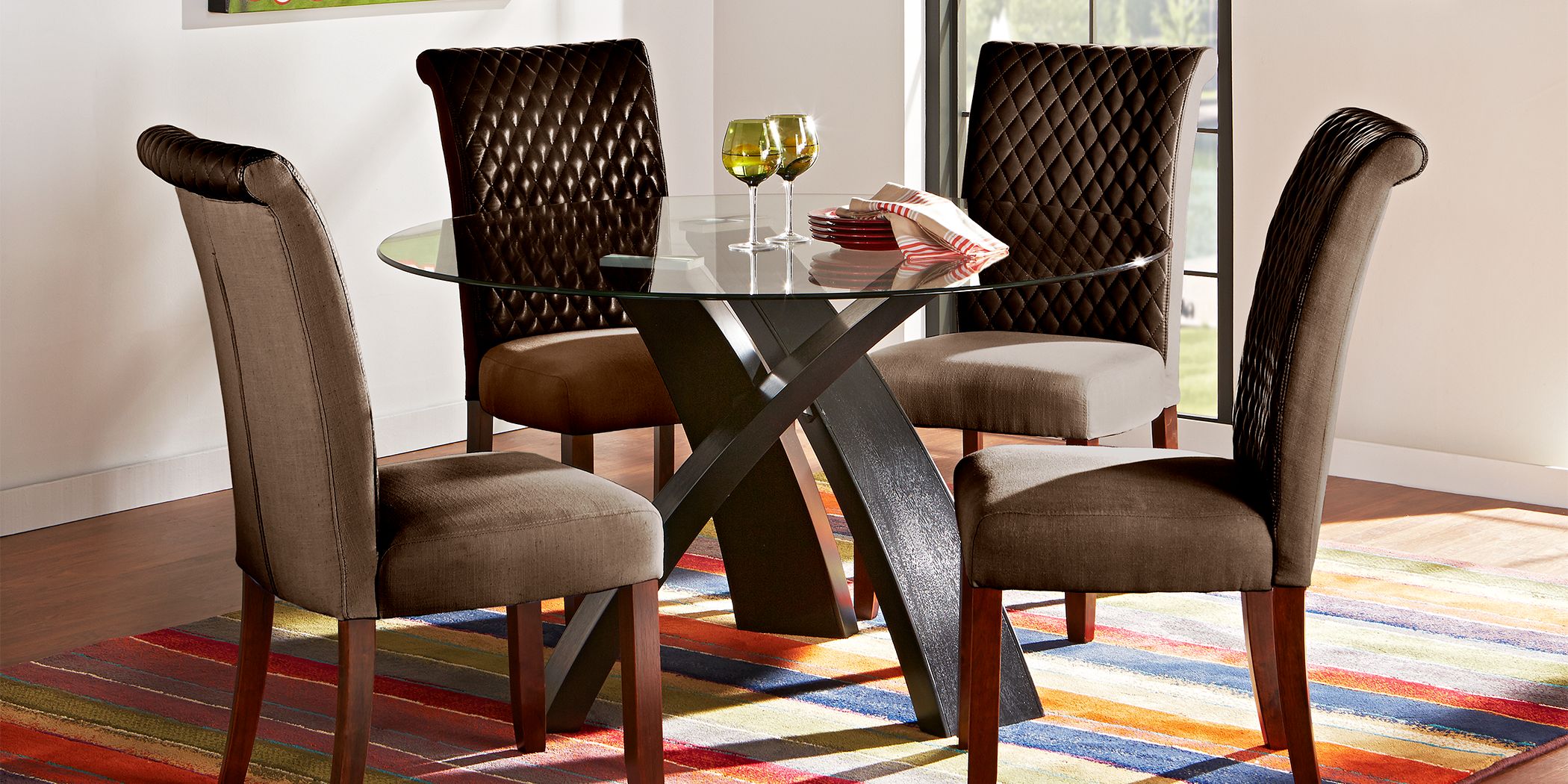 Del Mar Ebony 5 Pc Round Dining Set with Brown Chairs Rooms To Go